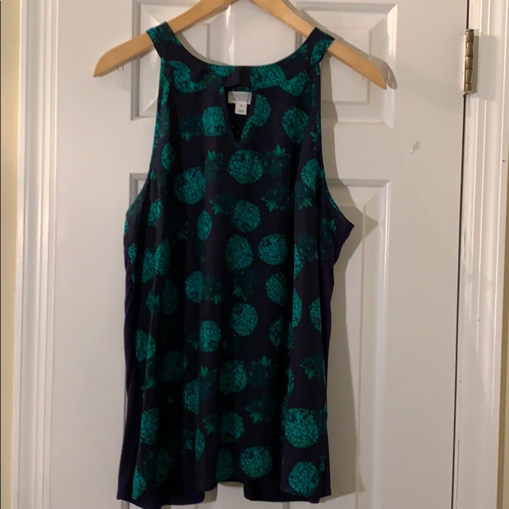Navy blue and green pineapple sleeveless shirt.